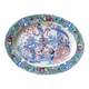 Oval Japanese plate with peacock decoration.