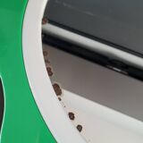 Plastic flower mirror by Finnish designer Makisen Kuvastin