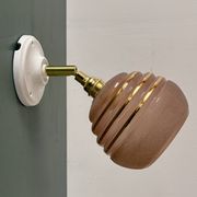 Vintage globe wall light in frosted pink and gold glass.