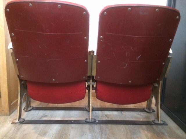 Pair of red skai leather cinema chairs