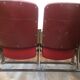 Pair of red skai leather cinema chairs