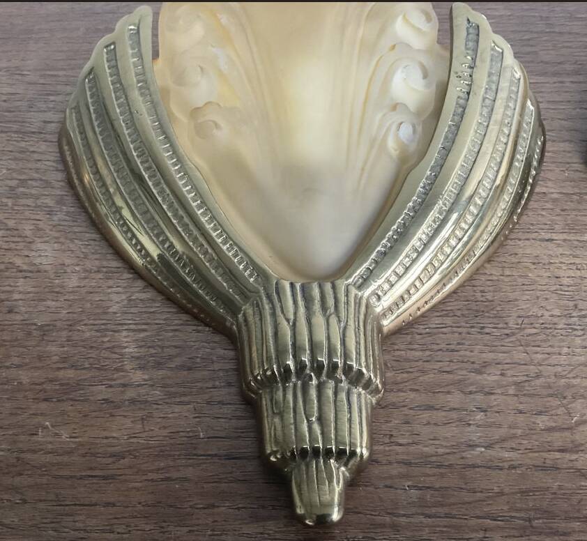 Pair of Art Deco wall lights in brass and moulded glass.