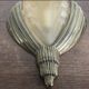 Pair of Art Deco wall lights in brass and moulded glass.