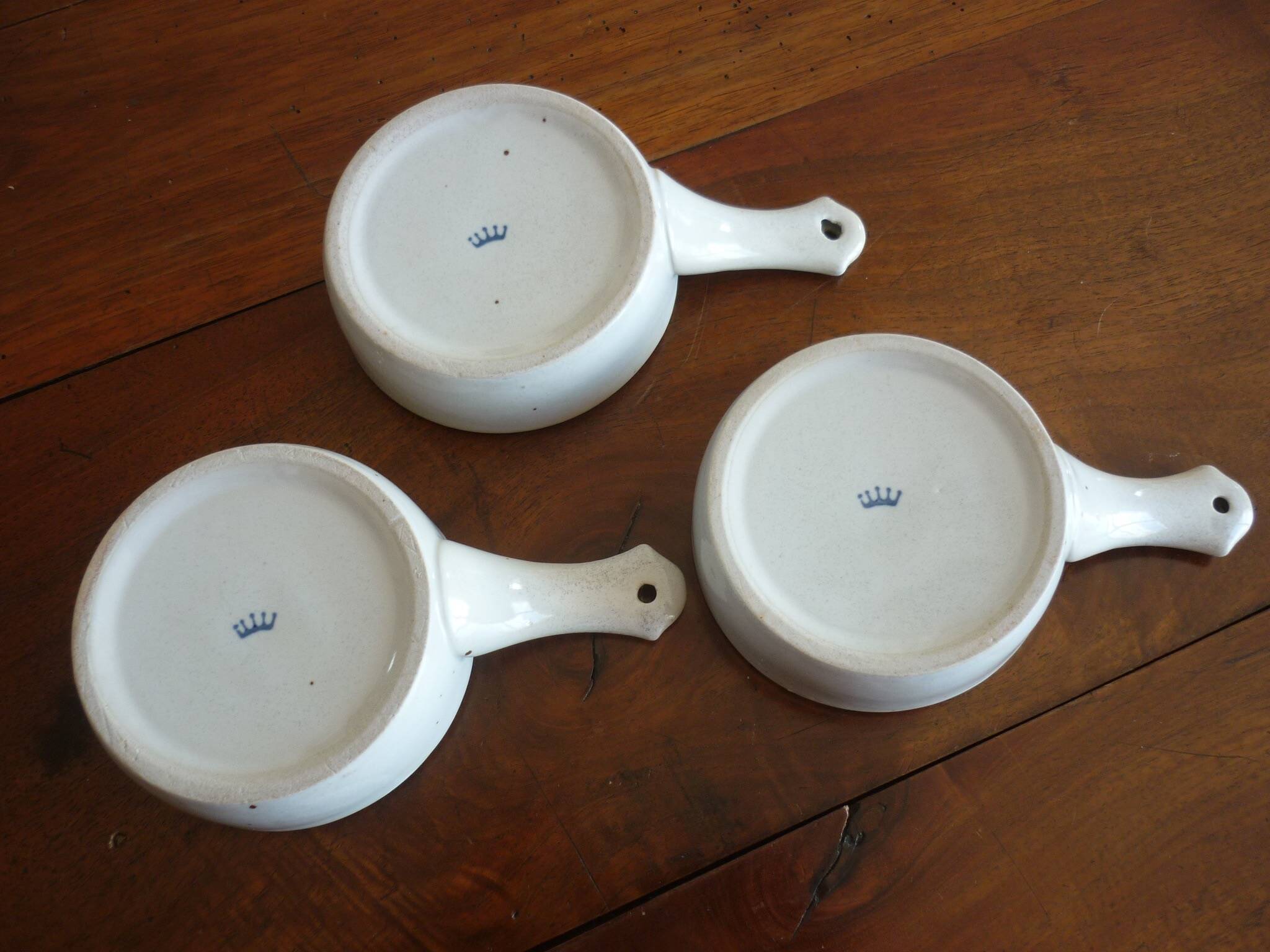 3 ceramic casserole dishes with blue and brown branch pattern