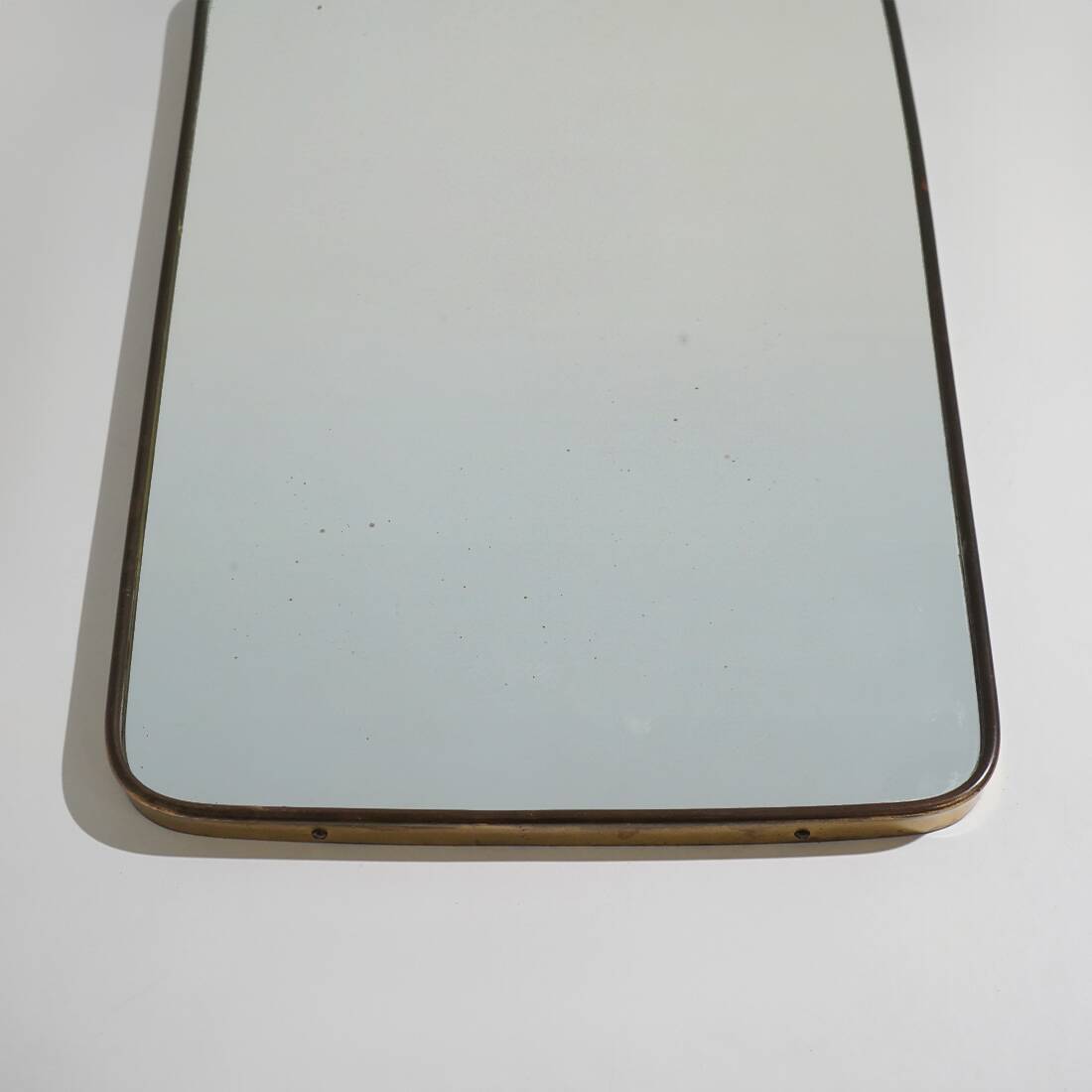 Wall mirror with brass frame, 1950s