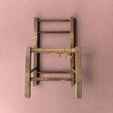 Vintage children's chair made of rope and wood