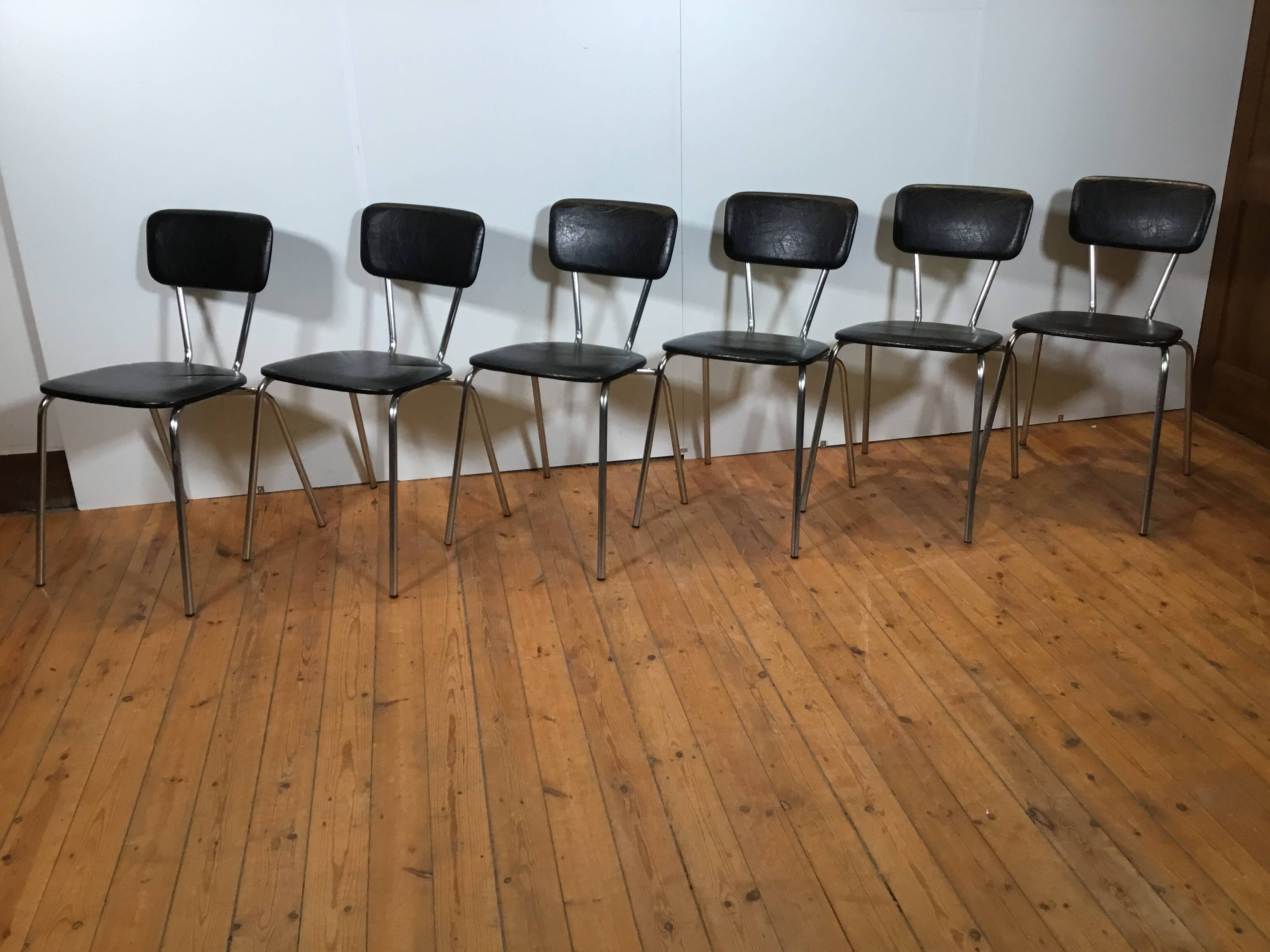 vintage chromed tubular steel stackable dining chairs