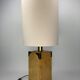 Cork and brass table lamp, bouclé shade. Leola Design Germany 1970s