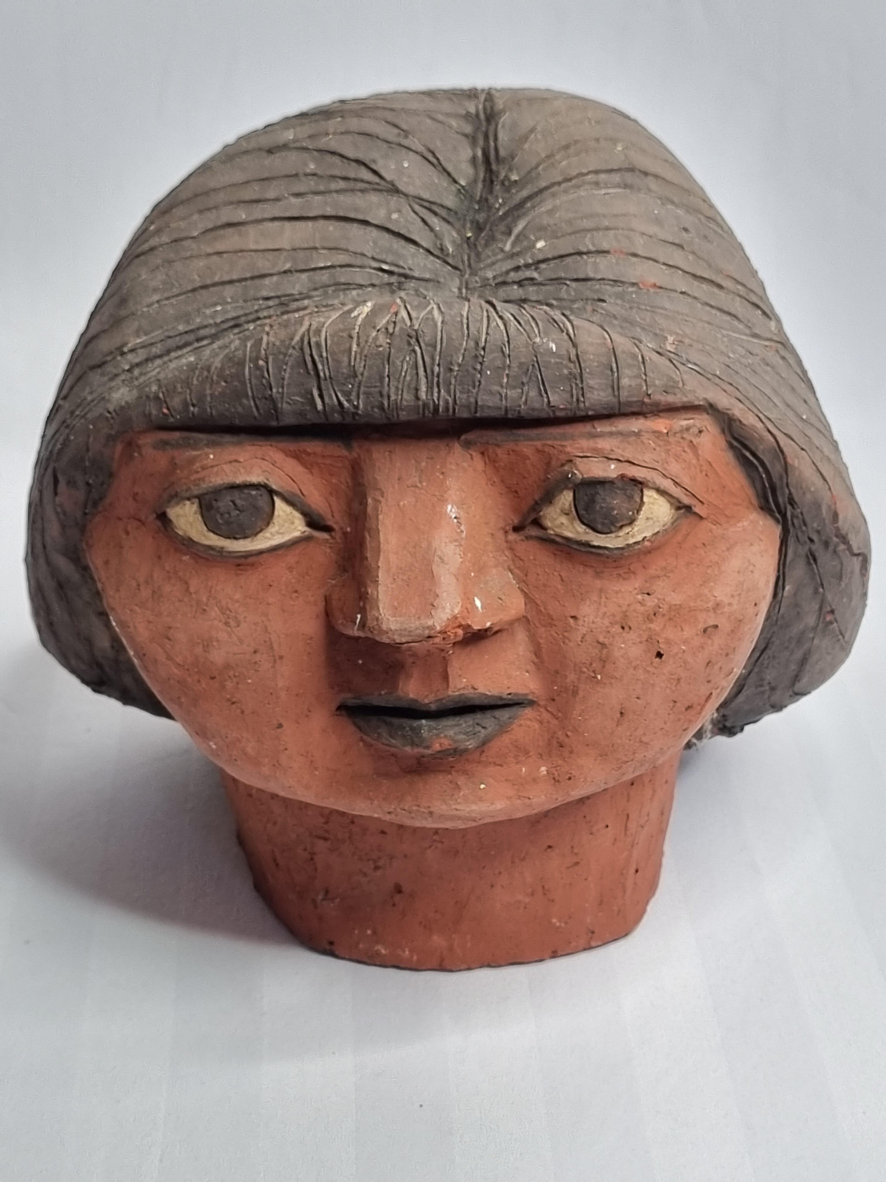 Set of 3 decorative women's heads in red terracotta