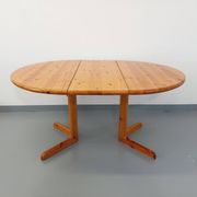 Suite of a round table with extension and 4 vintage pine chairs from the 60s and 70s