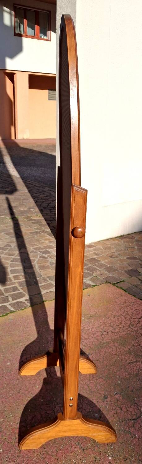 Adjustable full-length mirror for dressing room.