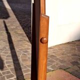 Adjustable full-length mirror for dressing room.