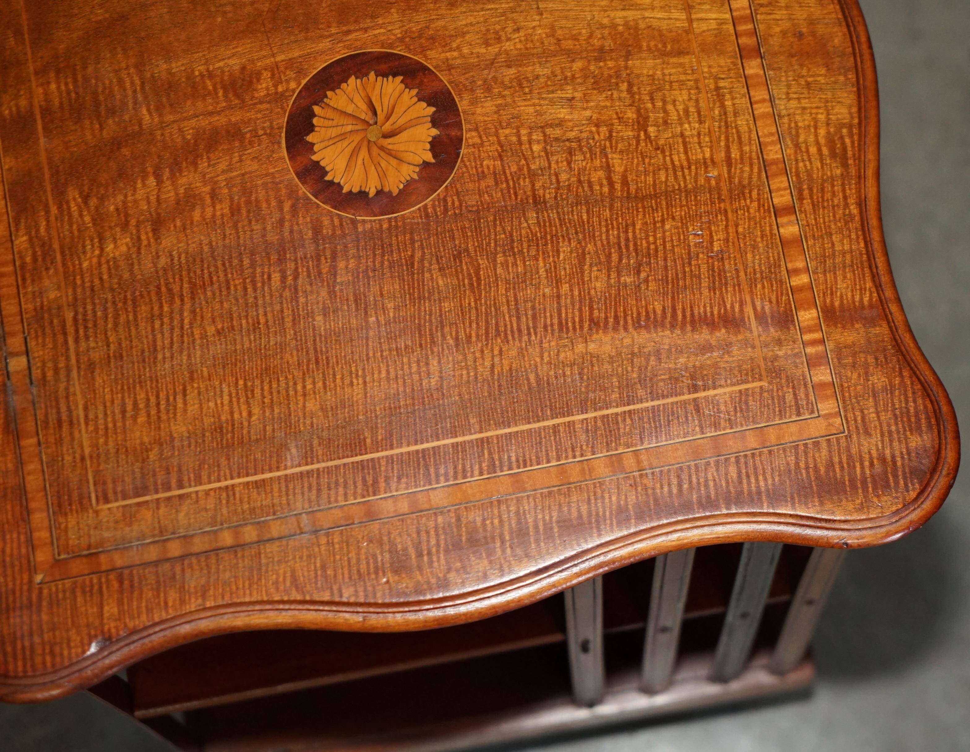 Sheraton-style rotating library table in walnut and satinwood.