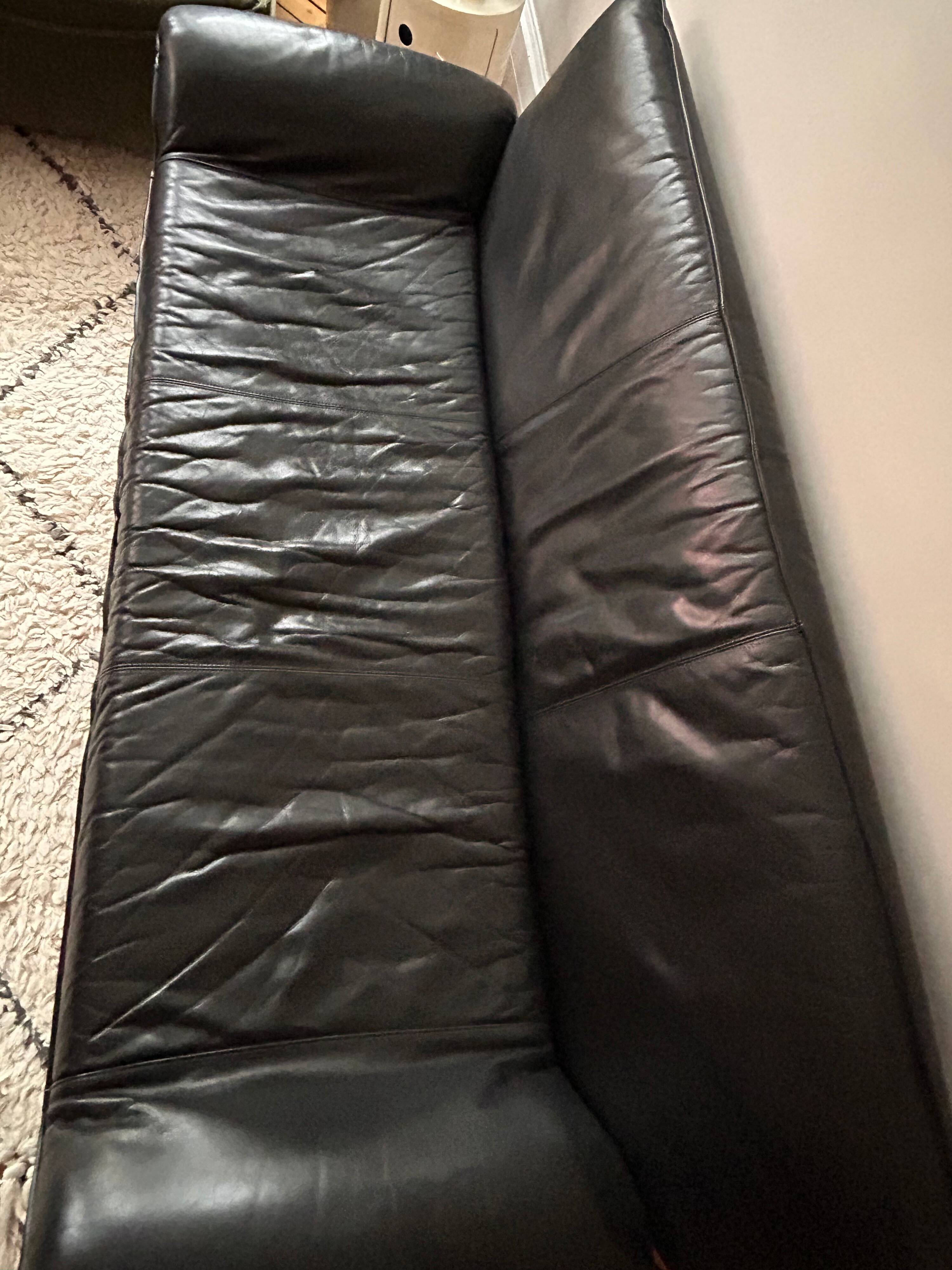 Black leather sofa designed by Johan Bertil Häggström