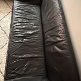 Black leather sofa designed by Johan Bertil Häggström