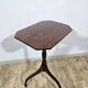 Antique octagonal mahogany side table on a classic tripod, 19th century.