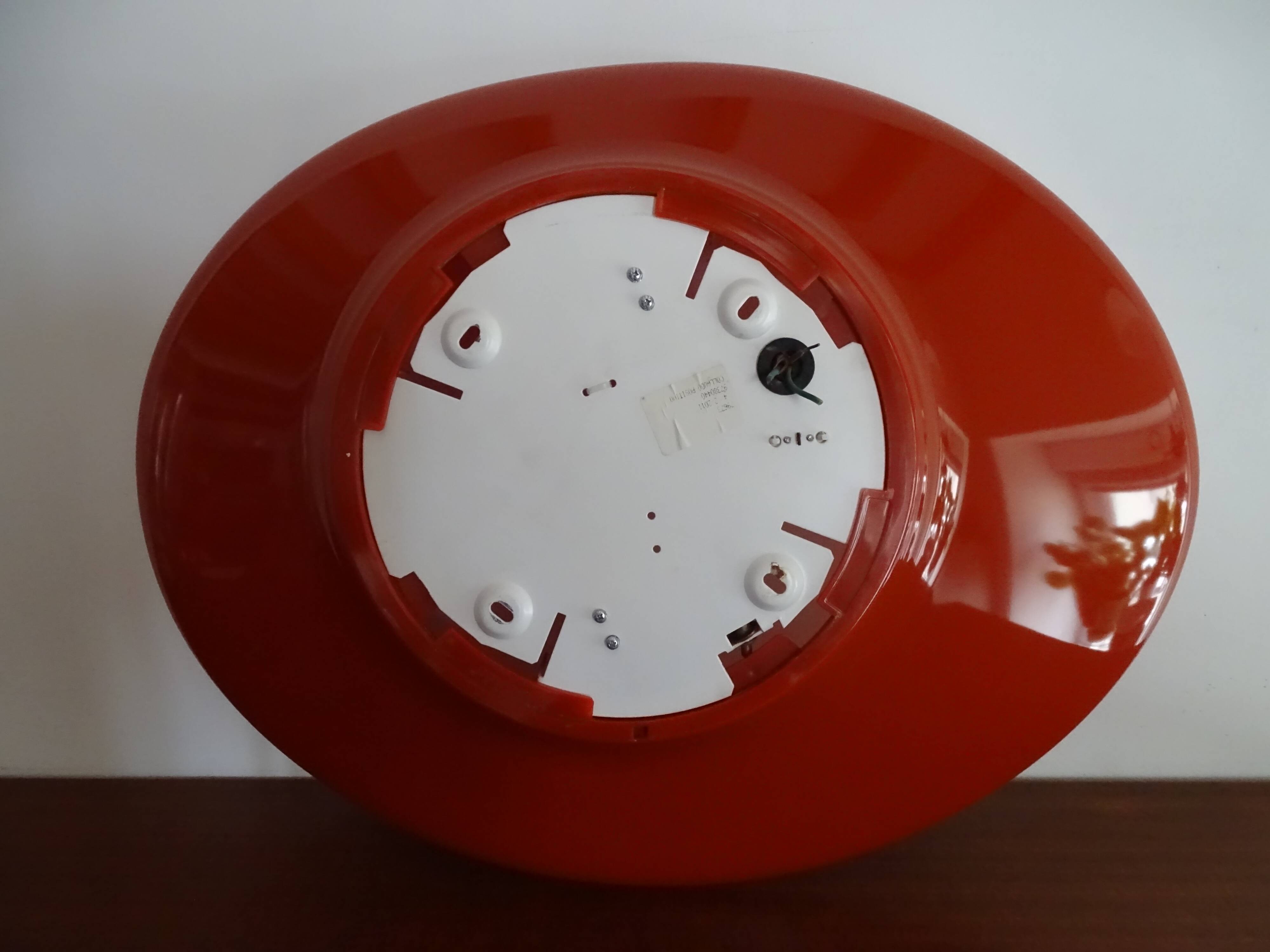 Oval wall lamp design ARTEMIDE 1980 by Patrick Jouin orange/white