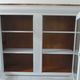 Showcase, bookcase, dresser style louis philippe patinated pearl gray, 2 glass doors.