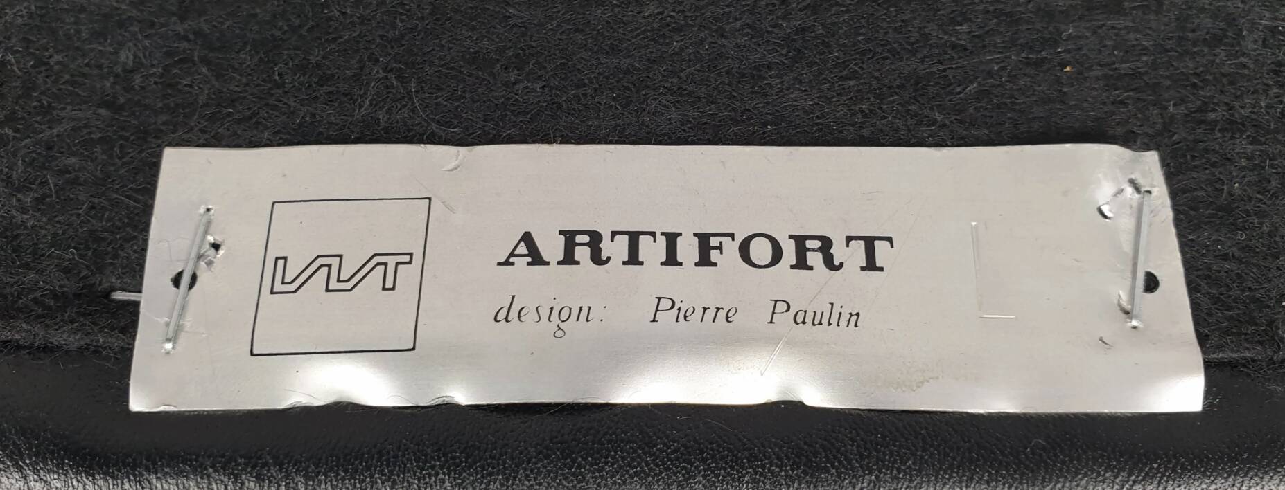Pair of armchairs by Pierre Paulin for Artifort, black leather and cream fabric.