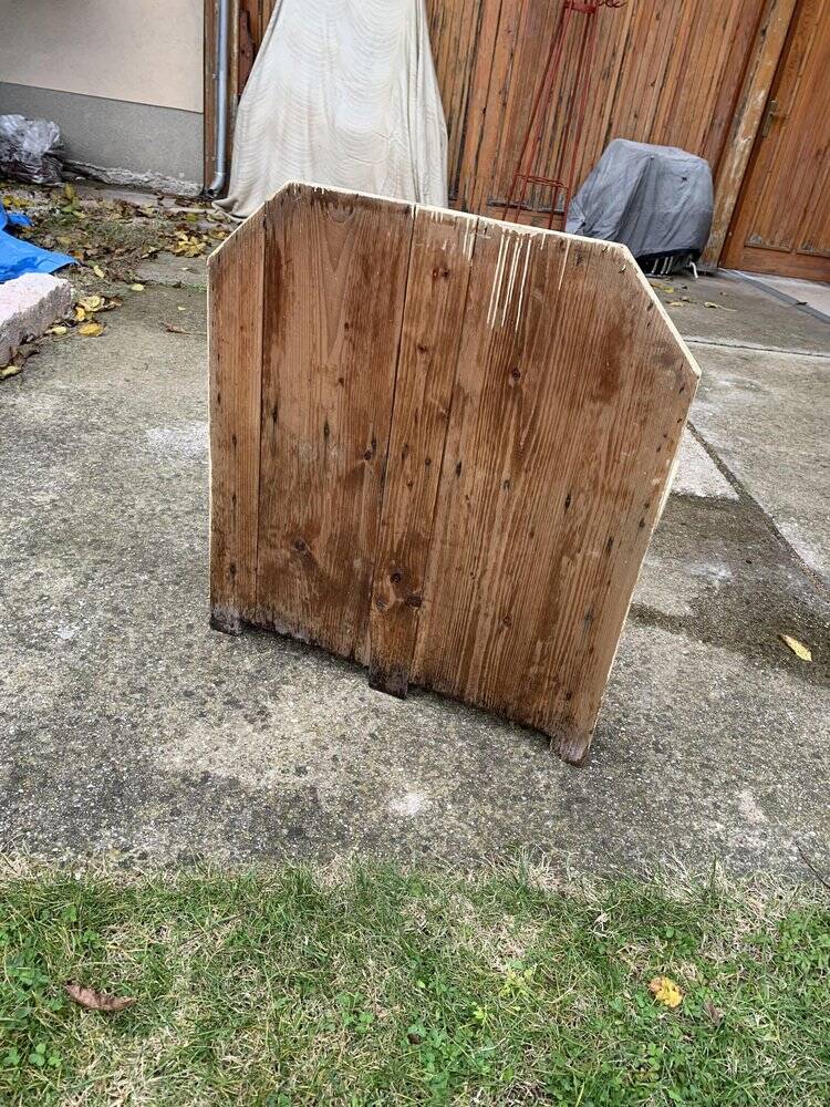 Small vintage yellow bench made of hand-painted wood, low storage from the 1920s.