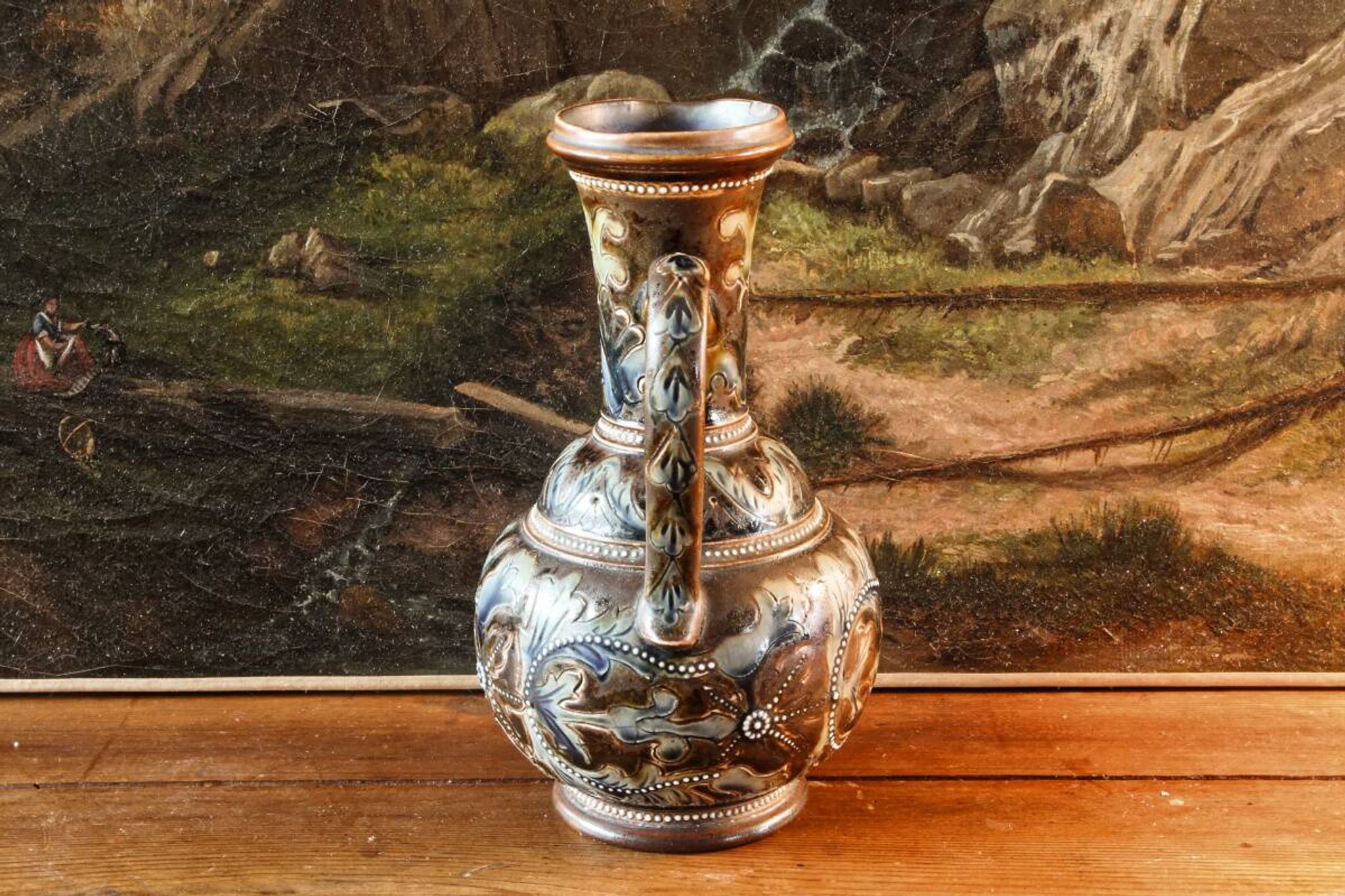 Doulton Lambeth stoneware jug (1879), floral decoration by Henry Winstanley.
