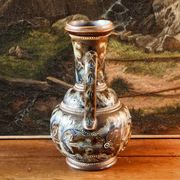 Doulton Lambeth stoneware jug (1879), floral decoration by Henry Winstanley.