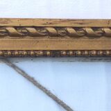 Gilded wooden frame and its glass