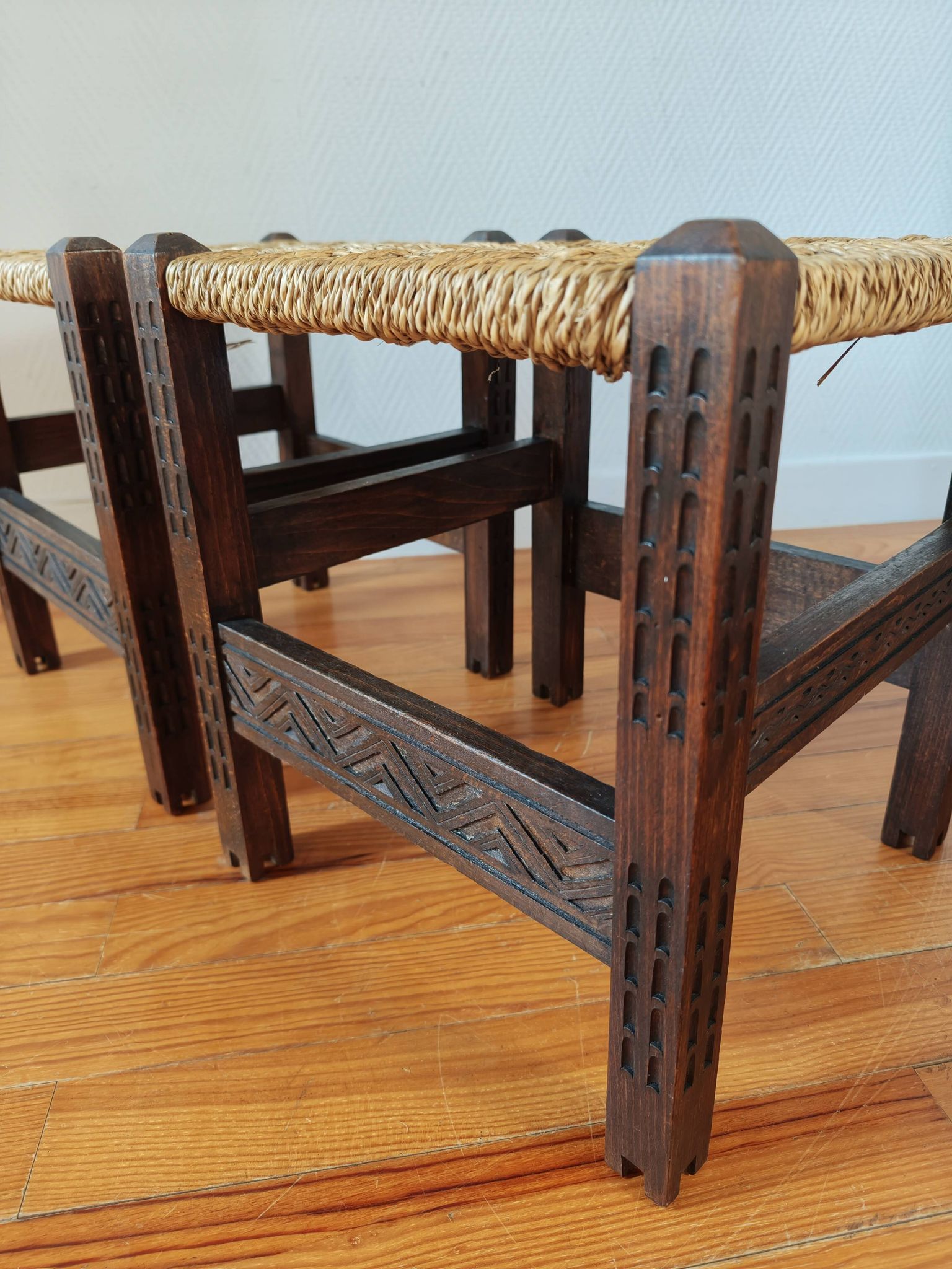 Pair of handcrafted stools from Friuli in carved wood, Italy, circa 1960.