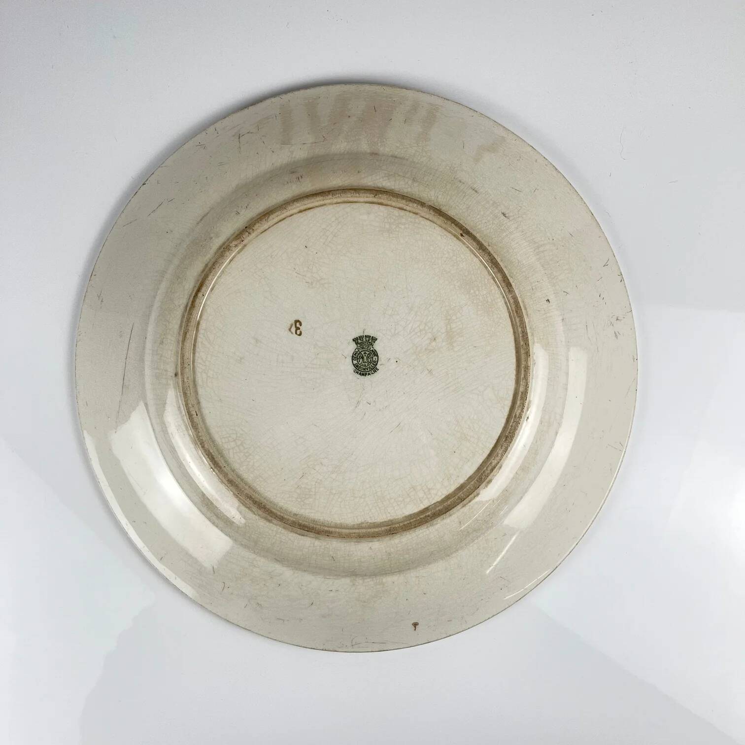 Plat rond "Champagne", Badonviller, vert, début XXème s.