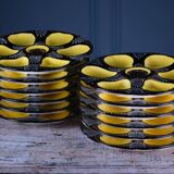Set of twelve handpainted Brittany yellow, cream and black oyster plates