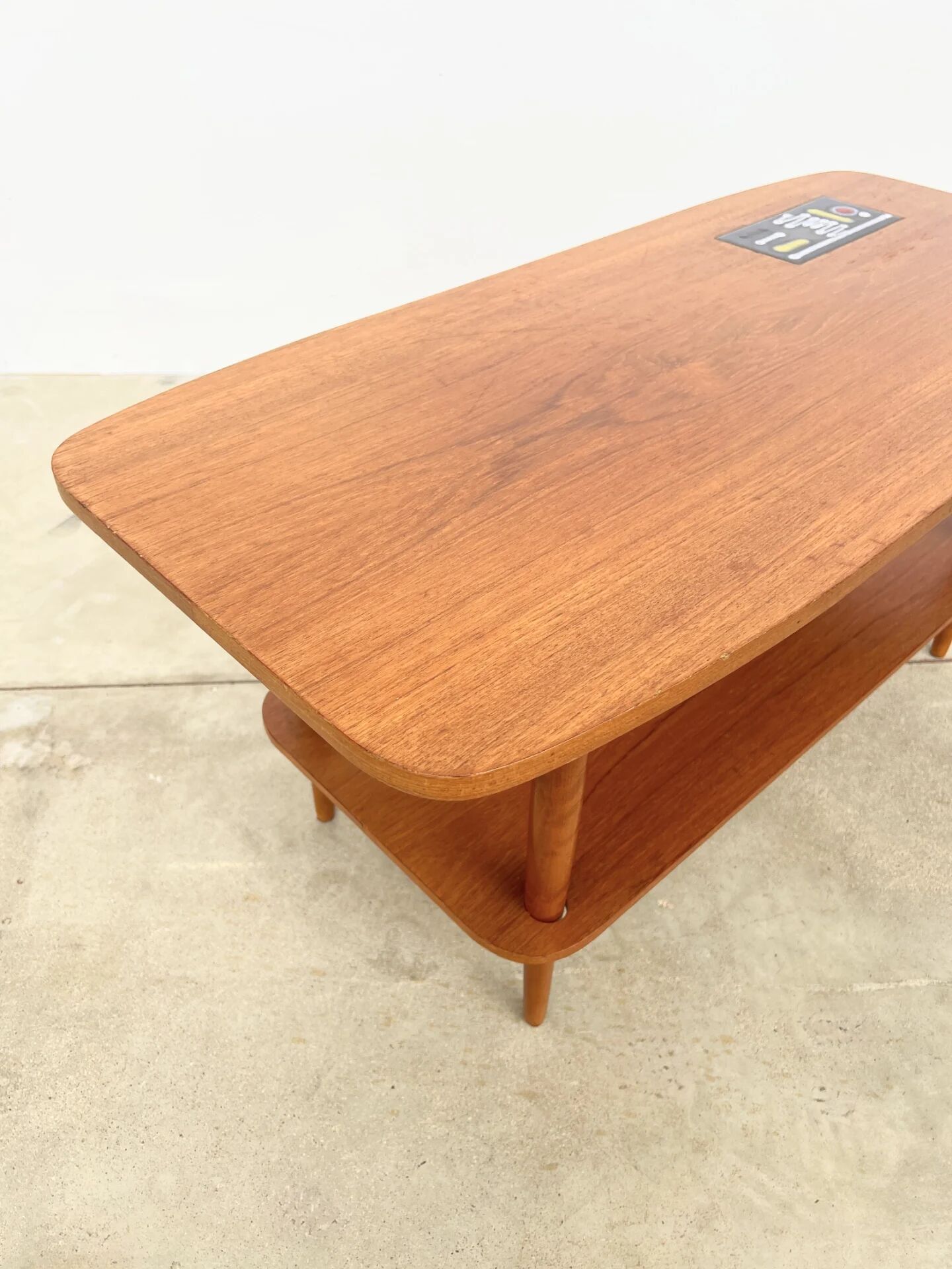 Teak coffee table with double top and ceramic insert — Scandinavian, 1960s
