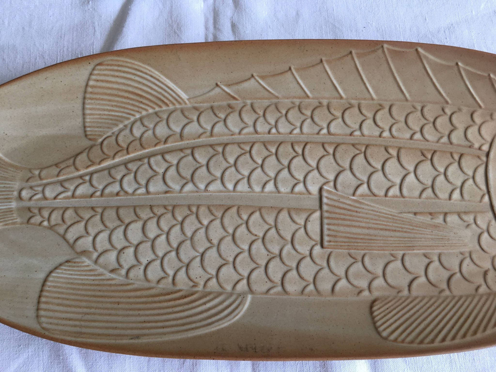 Very large fish dish stamped “Grès CNP Village France”