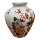 Vase decorated with birds and butterflies