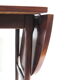 Oval vintage extendable dining table with wood grain