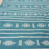 Hand-woven blue and white kilim rug in natural wool
