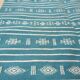 Hand-woven blue and white kilim rug in natural wool