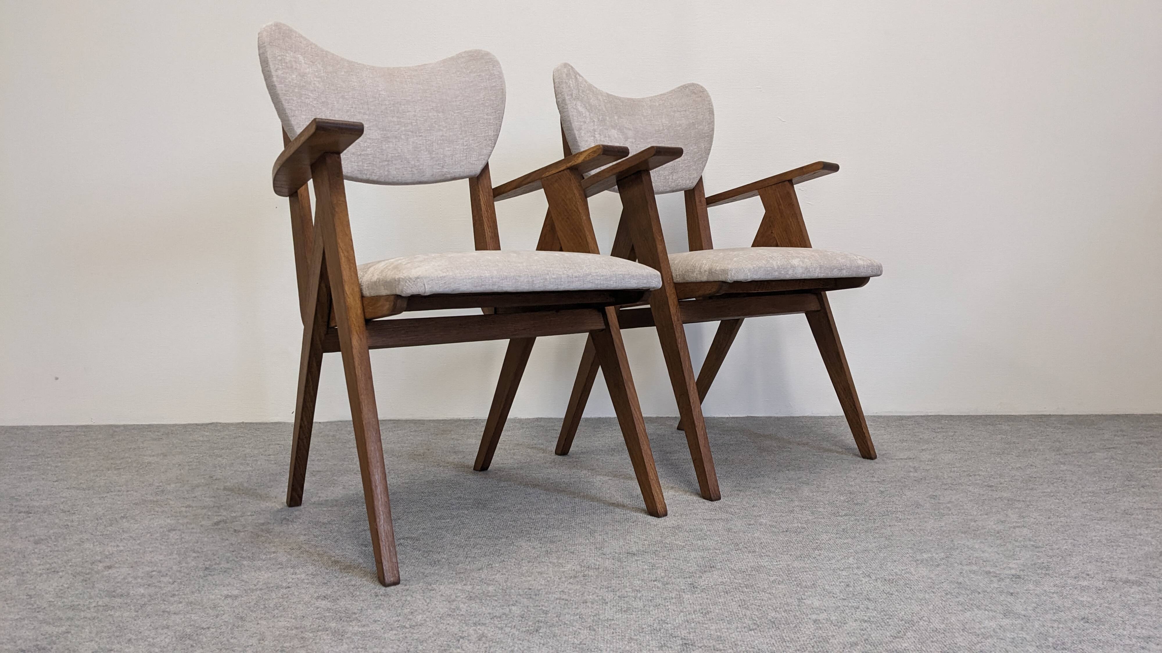 Pair of Scandinavian bridge armchairs in teak, Denmark circa 1950.