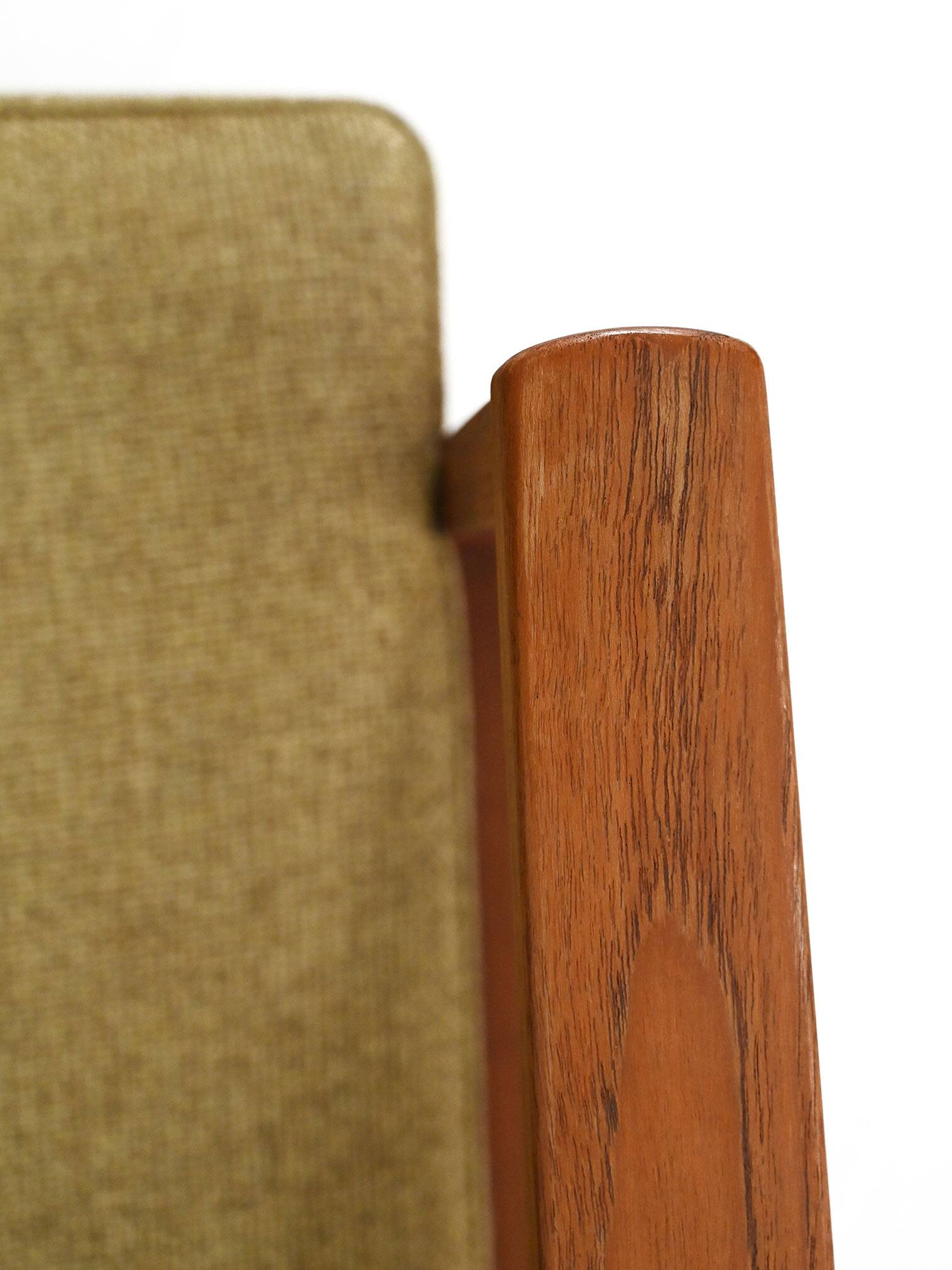 Pair of Danish teak armchairs with green upholstery