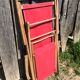 Former pliante long chair - wood foot rest - vintage red fabric