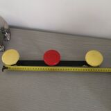 Coat rack with 3 iron balls