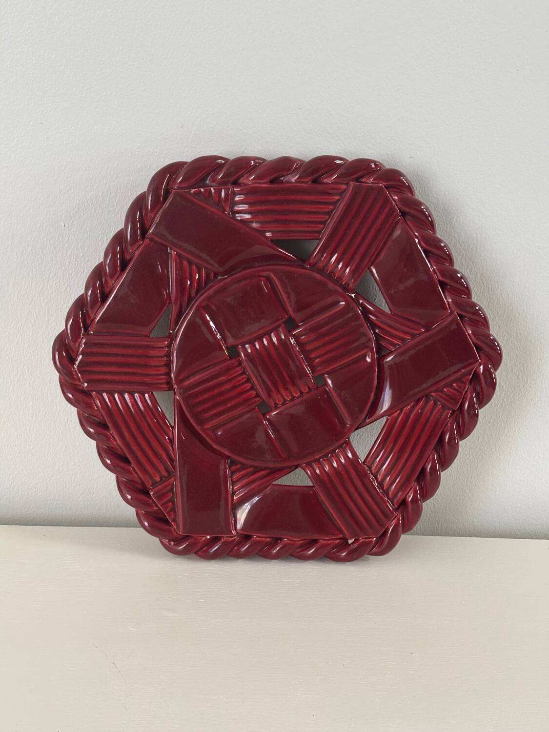Woven ceramic trivet