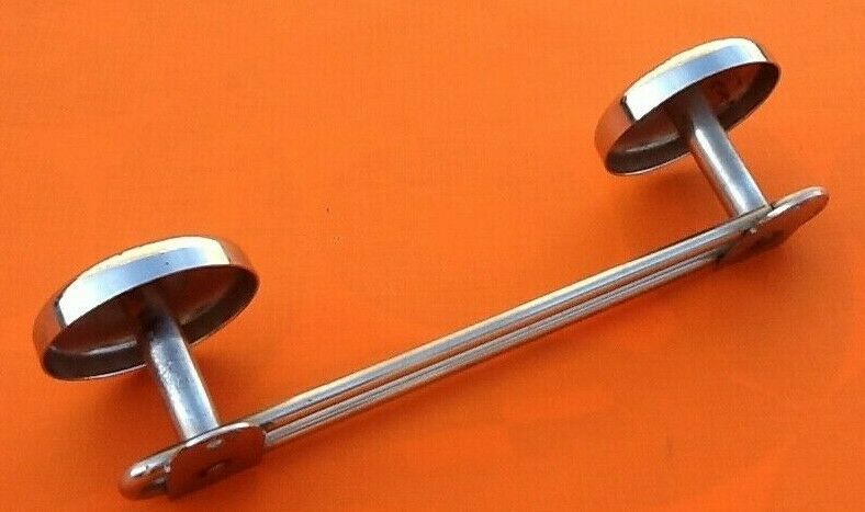 Former industrial-style wall coat rack