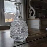 Round molded glass carafe with stopper