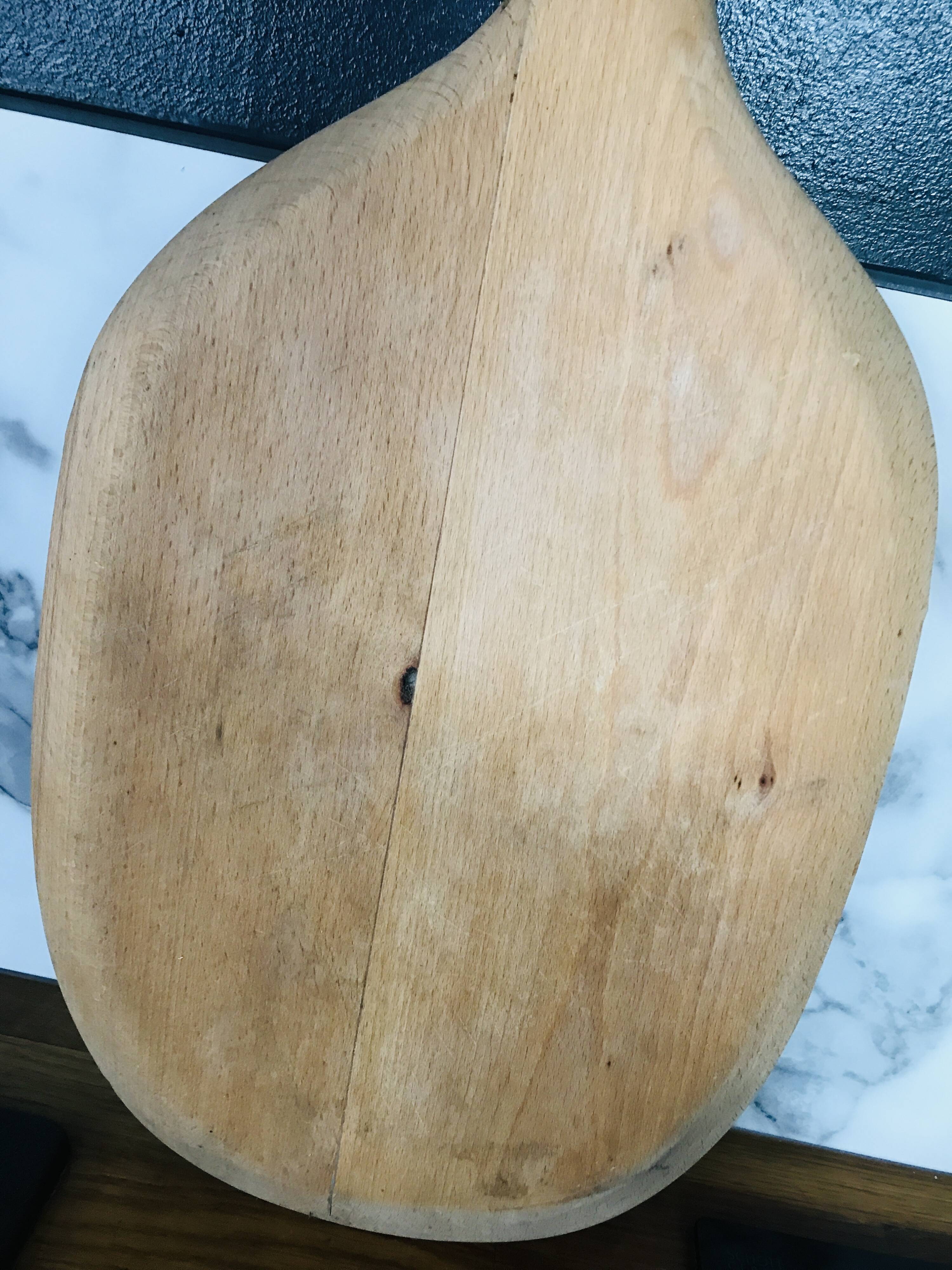 Vintage cutting board with swan neck handle