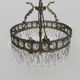 Old chandelier in bronze or silver brass, 4 lights, crystal grapevines. Year 60 70