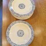 11 plates in opaque porcelain from Gien known as Terre de Fer
