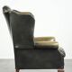 Vintage cowhide leather Chesterfield wingback armchair in a green colour