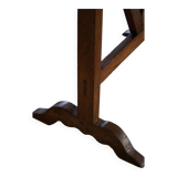 19th-century French round wine table with an adjustable top and floral textile surface.