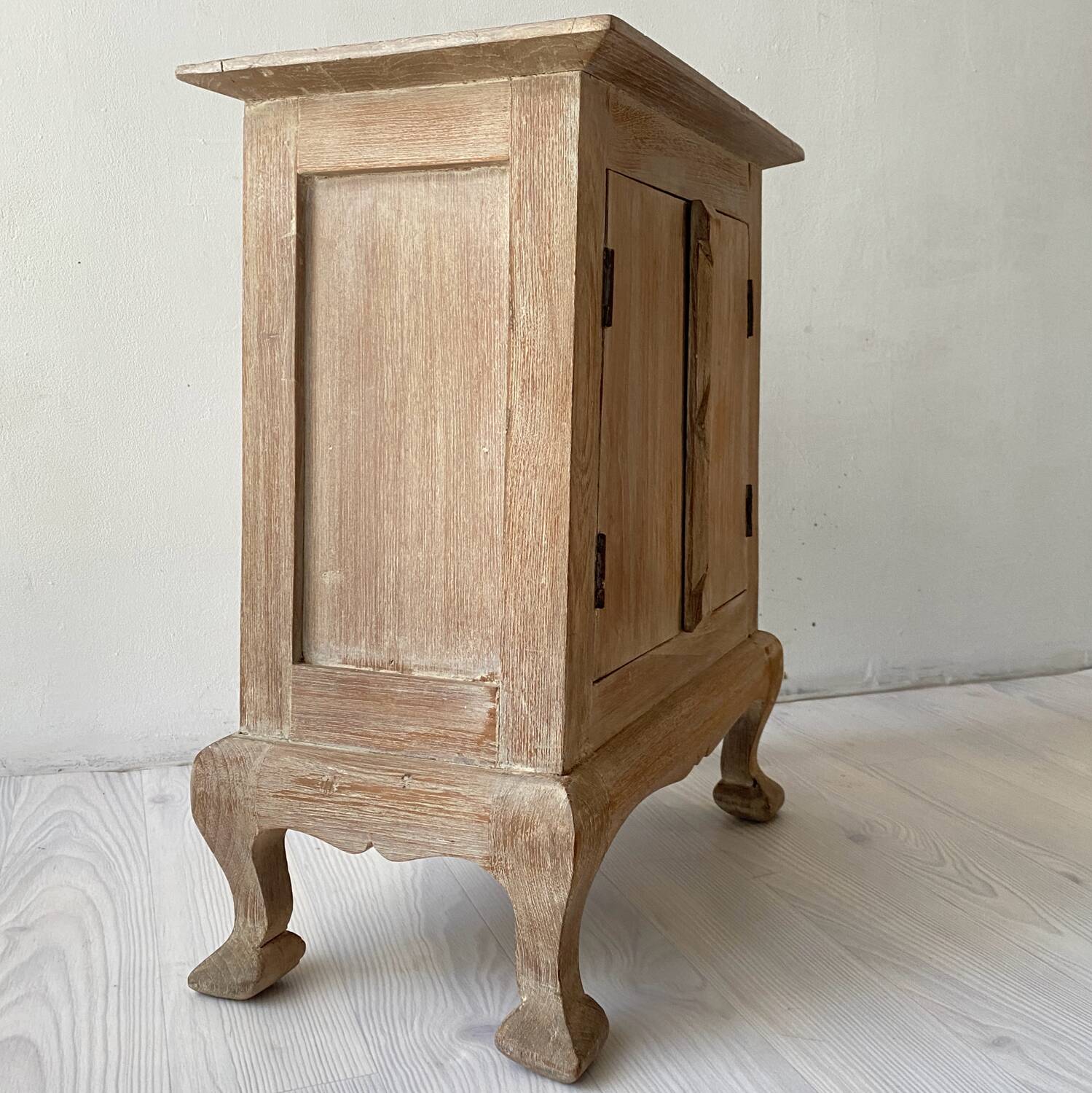 Balinese bedside table in solid carved and limed wood