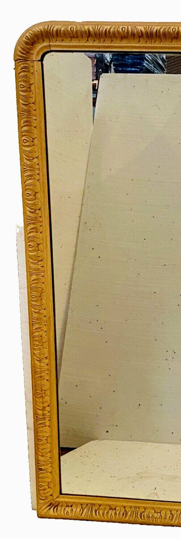 Louis Philippe mirror in wood and patinated stucco, 19th century.